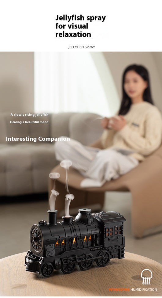 Black train-shaped essential oil diffuser and humidifier with retro design, emitting mist and glowing lights. - Image 7