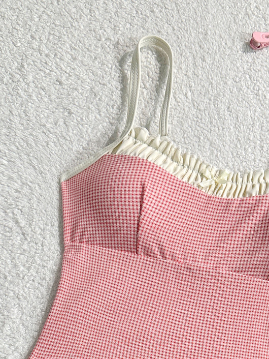 Gingham two-piece swimsuit with a camisole top featuring ruffled trim and a bow, paired with high-cut bikini bottoms. - Image 11