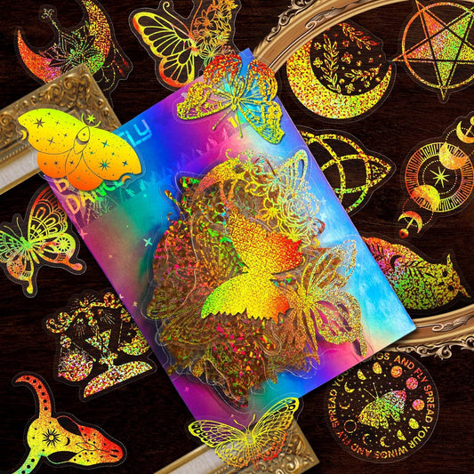 Transparent holographic butterfly laser stickers in various designs, including floral and moon elements, shown individually and in a 100-sheet pack.