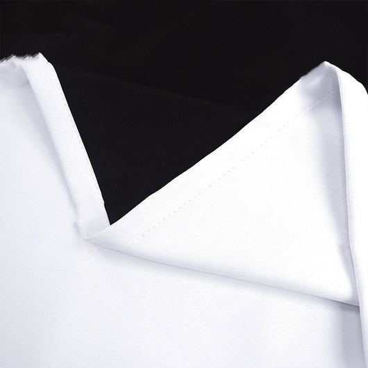 Close-up of a navy blue blackout curtain, showcasing the fabric texture and the black lining on the back. - Image 17
