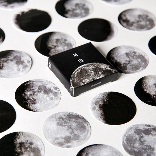 Circular black and white stickers depicting various moon phases, with a small black sticker box on a white background. - Image 7