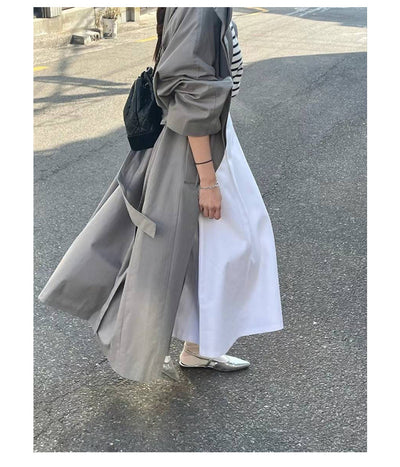 Gabardina Larga de Cuello Alto con Diseño Versátil y Elegancia Contemporánea - Image 29