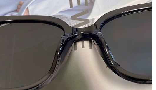 Cream square-style sunglasses with dark lenses, featuring small silver accents on the frame corners. - Image 19