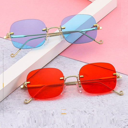 Frameless square sunglasses featuring vibrant blue lenses and sleek gold-colored metal temples and bridge.