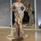Vestido de Fiesta Dorado con Detalles Brillantes para Damas