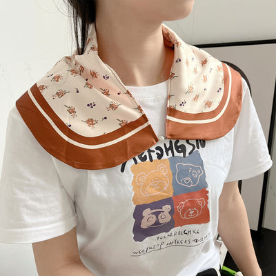 Female cream and black floral polka dot sun protection mask with ear loops, designed for eye corner protection. - Image 37