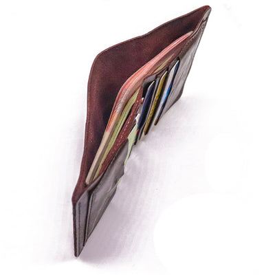 Billetera Vertical Minimalista en Cuero Genuino con Múltiples Compartimientos - Image 17
