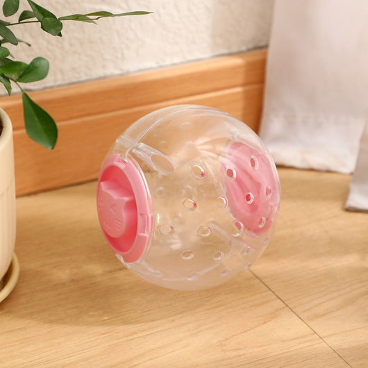 Clear plastic pet tumbler food leakage toy with blue accents and a cat face design, on a wooden floor. - Image 7