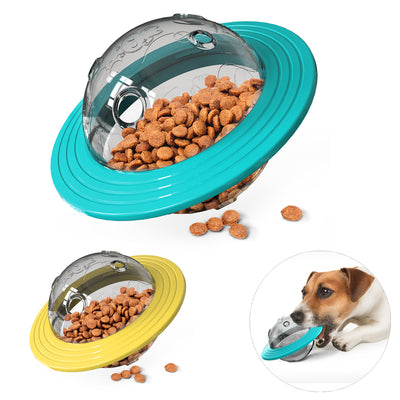 Clear dog treat dispensing ball with a yellow ring, resembling Saturn, featuring paw prints and bone designs.