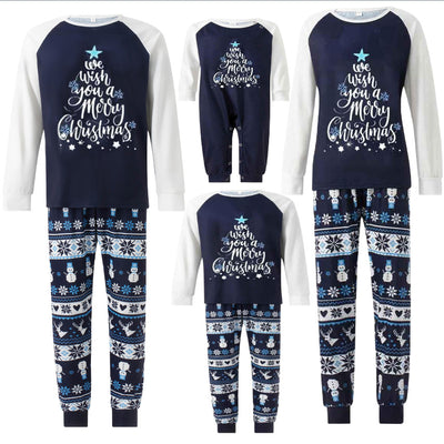 Matching family pajamas with navy blue and white raglan tops featuring a 'Let it Snow' graphic and snowman hat. Bottoms have a festive pattern of snowflakes, sn - Image 4