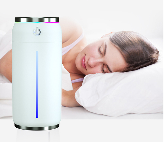 Black mini USB car humidifier shaped like a soda can, with a silver top and power button, and a white water level indicator. - Image 11