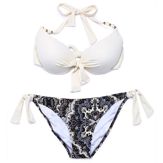Hot pink halter bikini top with front knot and gold beads, paired with a colorful paisley tie-side bikini bottom. - Image 5