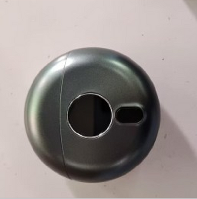 Dark gray mini electric razor with a circular design, featuring a small black display window and a silver trim. - Image 8