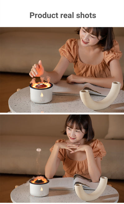 White ultrasonic essential oil diffuser with orange flame effect mist, alongside a gift set of Lavender, Peppermint, Tea Tree, and Sweet Orange essential oils. - Image 20