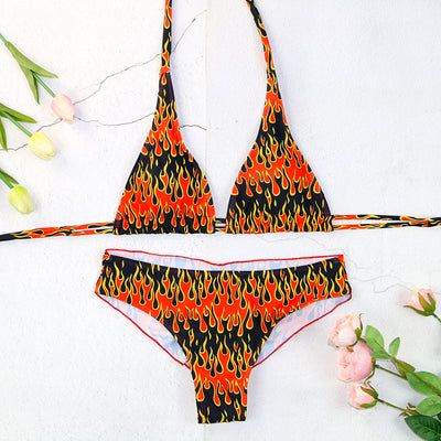 Flame print bikini swimsuit with a bandeau triangle top and tie-side split bottom in red, orange, yellow, and black. - Image 15