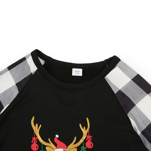 Family matching Christmas pajamas with black and white buffalo plaid sleeves and pants, featuring a reindeer graphic. - Image 3