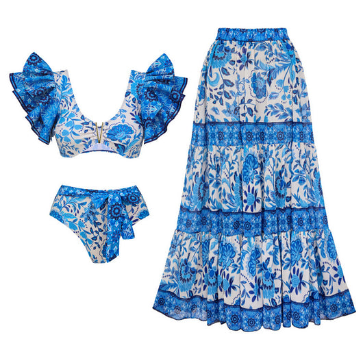 Women's blue and white floral two-piece swimsuit with ruffled cap sleeves and high-waisted bottom. - Image 6