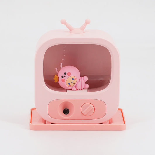 Pink TV-shaped desktop humidifier with a cute pink caterpillar figure inside, featuring a mist outlet and control knob. - Image 5