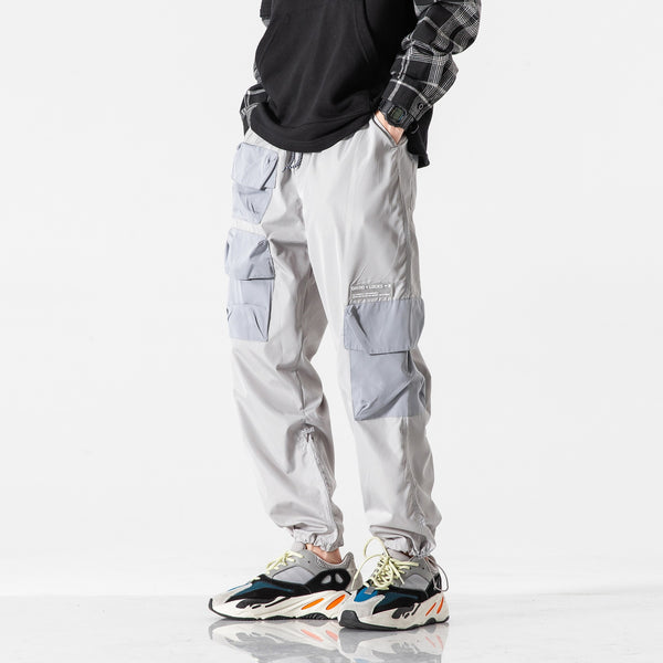 Pantalones Deportivos Funcionales Holgados con Múltiples Bolsillos