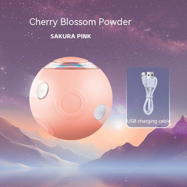 Sakura pink smart pet ball with automatic obstacle avoidance and luminous rotation, shown with its USB charging cable. - Image 5