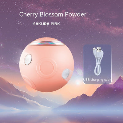 Sakura pink smart pet ball with automatic obstacle avoidance and luminous rotation, shown with its USB charging cable. - Image 5