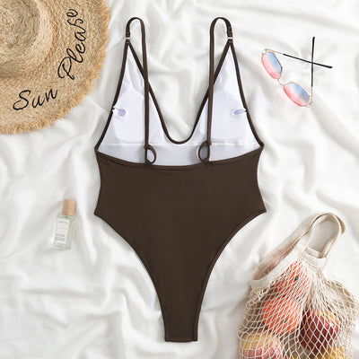 Dark brown one-piece swimsuit with a deep V-neckline and thin adjustable straps, styled with a straw hat and sunglasses. - Image 24