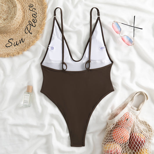 Dark brown one-piece swimsuit with a deep V-neckline and thin adjustable straps, styled with a straw hat and sunglasses. - Image 24