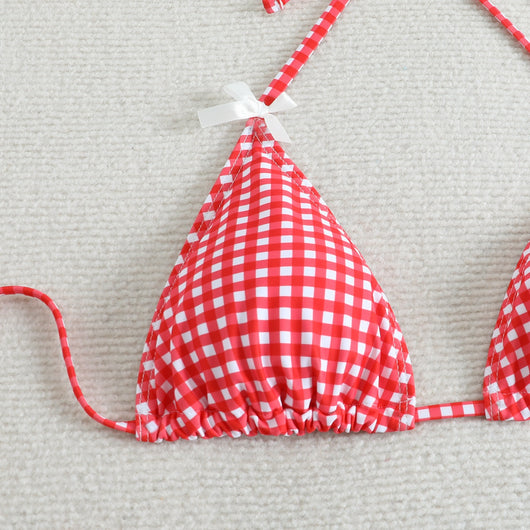 Red and white gingham print bikini swimsuit with a triangle halter top and high-cut bottom, featuring small white bows. - Image 9