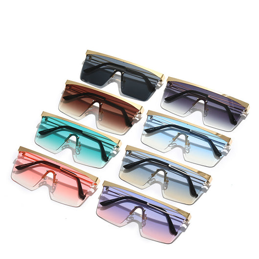 Gold frame square sunglasses with a one-piece gradient blue lens and black temple tips. - Image 12