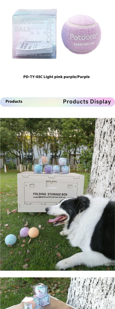 Peach yellow Petdora high elastic tennis ball dog toy next to its clear iridescent 'Popping Ball' packaging. - Image 12