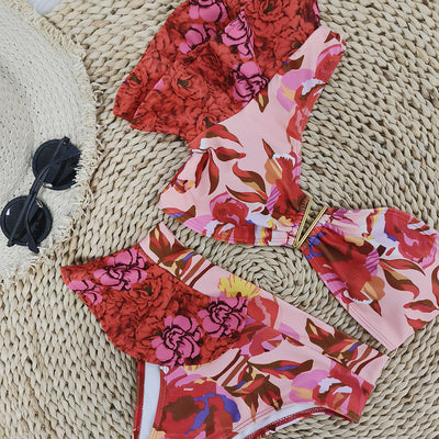 Women's one-shoulder ruffled bikini with a vibrant red and pink floral print, high-waisted bottoms. - Image 4