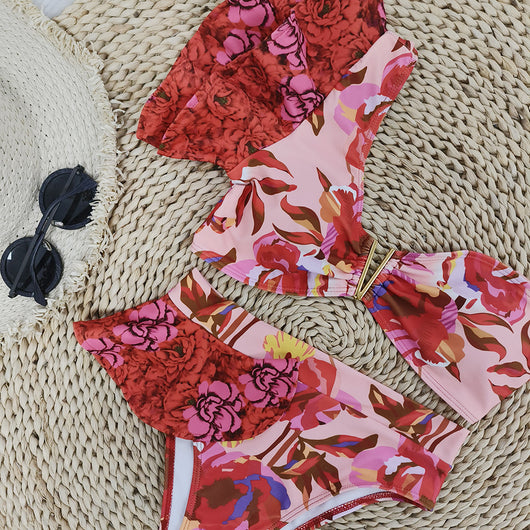 Women's one-shoulder ruffled bikini with a vibrant red and pink floral print, high-waisted bottoms. - Image 4