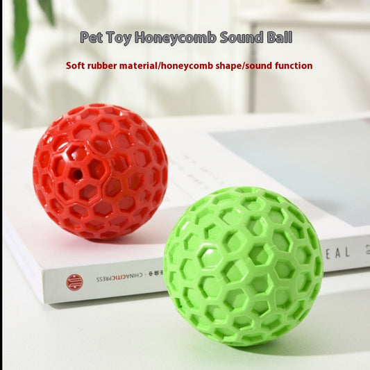 Red 65mm dog toy ball with a textured honeycomb surface, designed for vocalization, bite-resistance, and molar relief.
