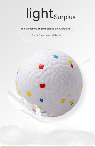 White bone-shaped dog toy with colorful speckles, labeled as interactive and bite-resistant. - Image 15