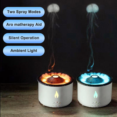 White ultrasonic essential oil diffuser with orange flame effect mist, alongside a gift set of Lavender, Peppermint, Tea Tree, and Sweet Orange essential oils. - Image 7