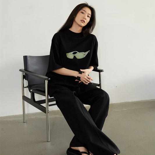 Blusa Corta Verde Cápsula con Gafas - Diseño Moderno
