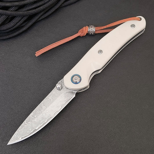 Cuchillo Plegable Acero Damasco para Aventuras al Aire Libre - Image 5
