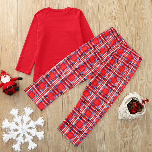Red and white family Christmas pajamas with a reindeer graphic on the tops and red plaid pants, including a baby romper and hat. - Image 6