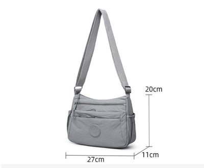 Bolsa Mensajera Casual Ligera Multicompartimento Diseño Simple - Image 11