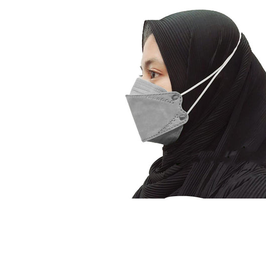 Orange KF94-style headloop face mask worn by an adult with a black hijab, designed for respiratory protection. - Image 4