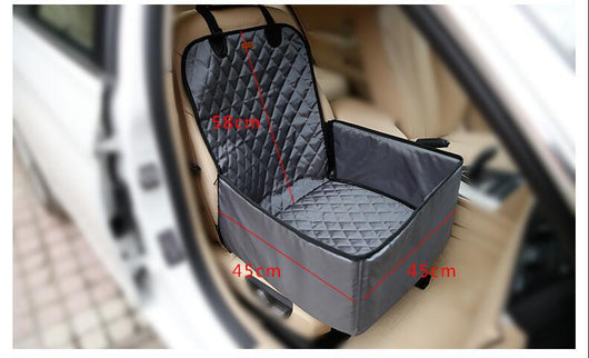 Black quilted waterproof pet car seat for front passenger seat, with a small black dog sitting inside. - Image 5