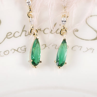 Aretes de Perla Verde Esmeralda con Brillo Cristalino - Image 10