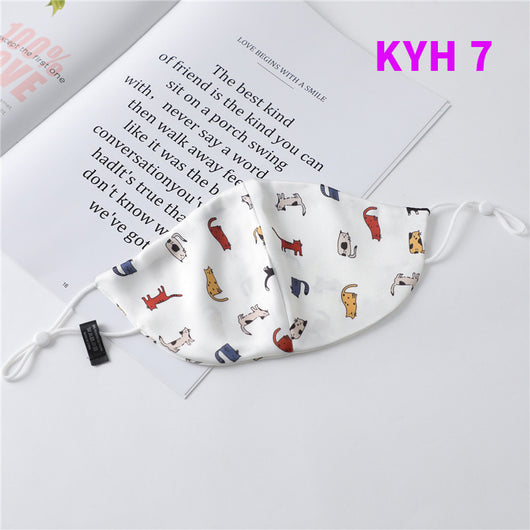 White silk face mask with light blue floral pattern and adjustable ear loops for women's sun protection. - Image 8