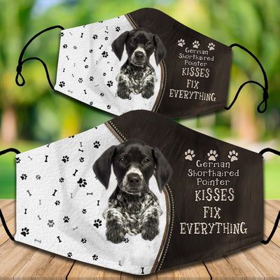 Two cotton face masks with a Bichon Frise dog, paw prints, and bones on a white and brown background. Text reads "Bichon Frise KISSES FIX EVERYTHING." - Image 35