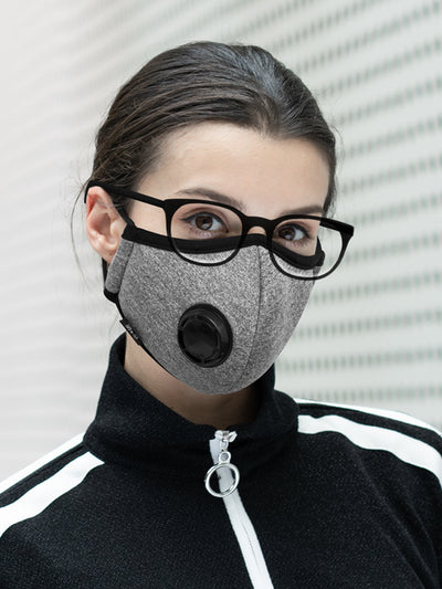 Man wearing a black knitted anti-fog face mask with an exhalation valve, black-rimmed glasses, and a dark grey shirt. - Image 9
