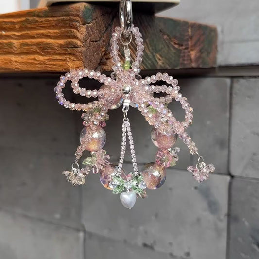 Encanto de Móvil con Moño de Cuentas Brillantes