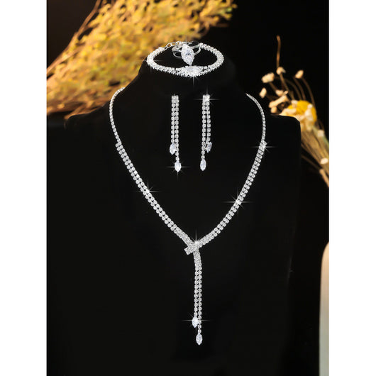 Sparkling rhinestone necklace, dangle earrings, and bracelet set on a black display, perfect for formal events. - Image 6