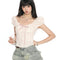 Blusa Corta con Mangas Abullonadas y Moño