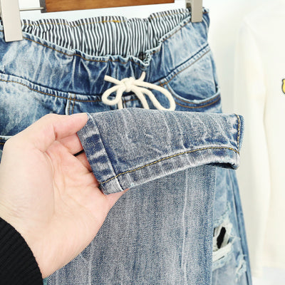 Jeans Oversized Rotos con Estilo Urbano - Image 10
