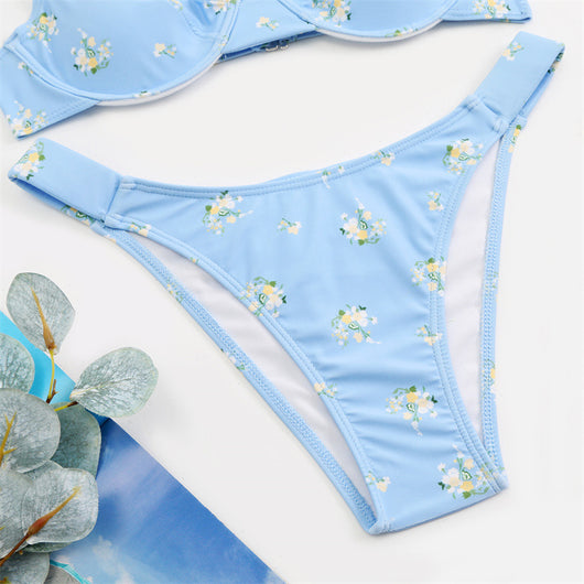 Light blue floral bikini with pink and yellow flowers, featuring an underwire top and high-cut bottom. - Image 11